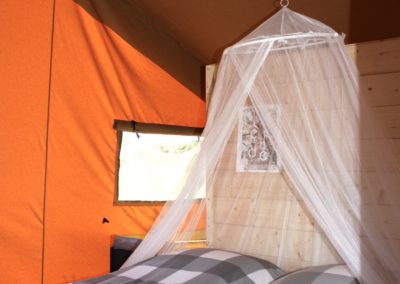 comfortable beds in the glamping tents Le Marche